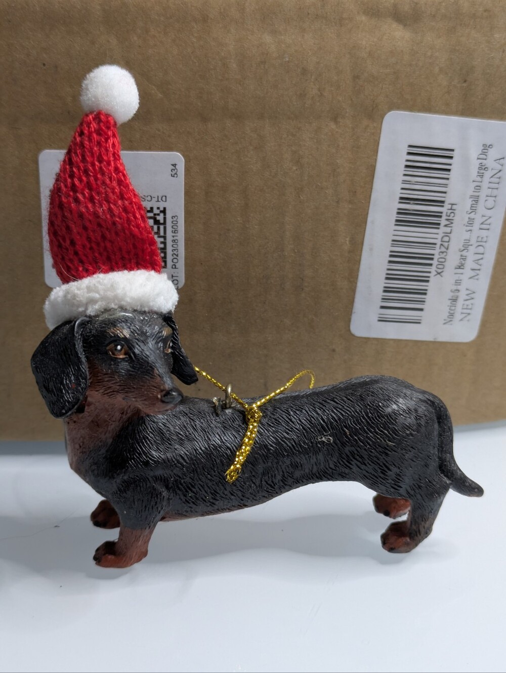 Black and Tan Dachshund Christmas Ornament - Wiener Dog Figurine with Santa Hat